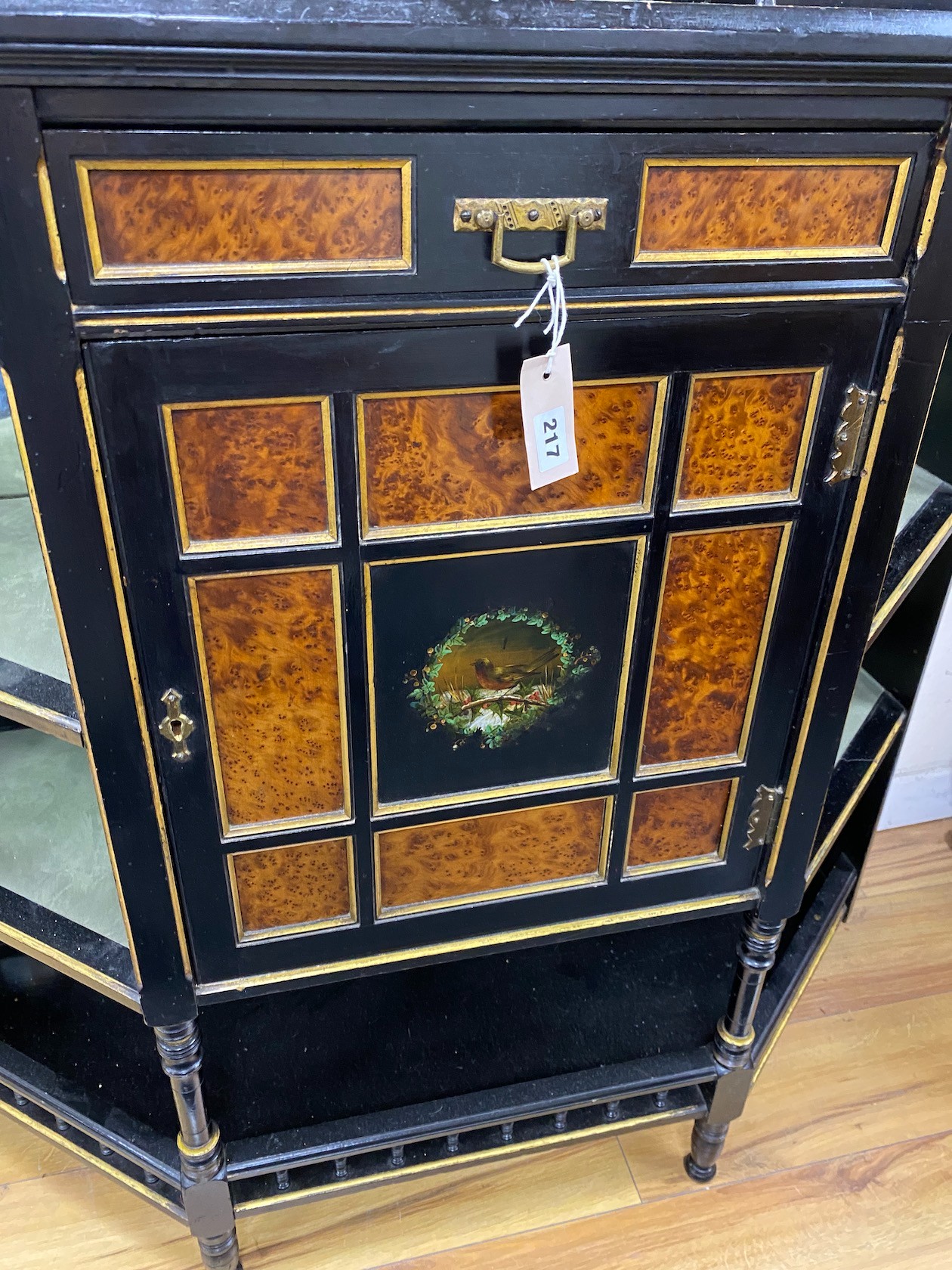 A late Victorian aesthetic movement ebonised and bird's eye maple mirror-back break front sideboard with inset painted panels of birds, width 106cm, depth 36cm, height 175cm